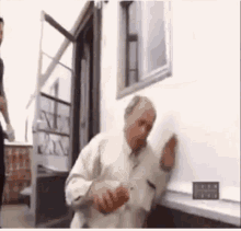 The classic Jim Lahey meme where he falls down the stairs of a trailer