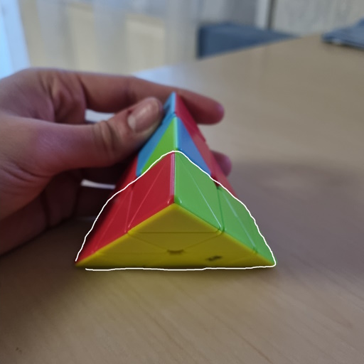 Picture of a Pyraminx where the bottom layer has been solved