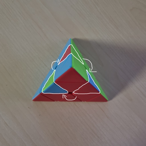 Picture of a Pyraminx showcasing the middle layer edge rotation