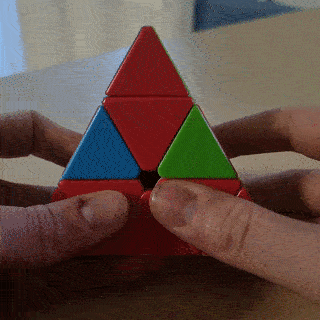 GIF of a Pyraminx middle layer edge flip