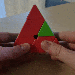 GIF of a Pyraminx middle layer edge rotation